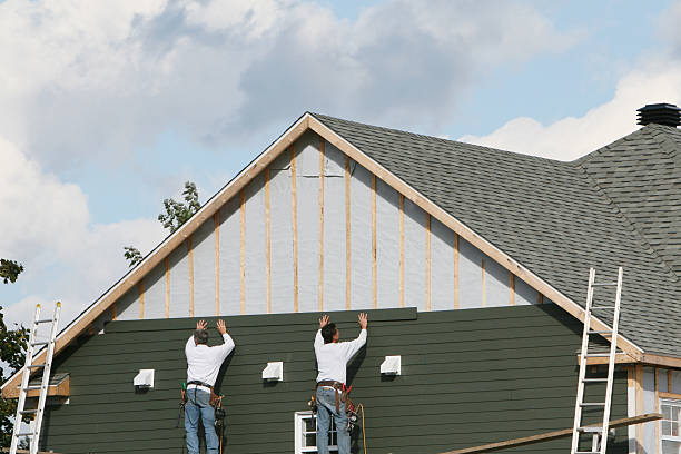 Professional Siding Contractor technician working in Mansfield, PA